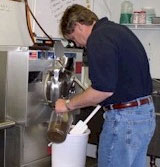 Owner, Wally Walsh, making ice cream
